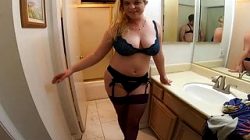 Stepson watches stepmom taking off her lingerie, then has sex